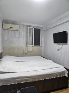 Postel nebo postele na pokoji v ubytování Guest house 2 floor