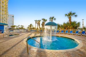 a fountain in the middle of a swimming pool at Bay Watch 1901 in Myrtle Beach