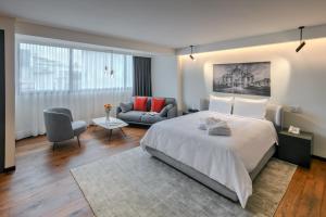 Postel nebo postele na pokoji v ubytování Amberes 64, Ascend Hotel Collection