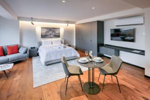 TV a/nebo společenská místnost v ubytování Amberes 64, Ascend Hotel Collection