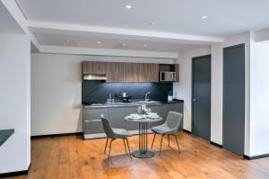 Kuchyň nebo kuchyňský kout v ubytování Amberes 64, Ascend Hotel Collection