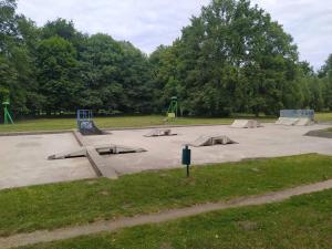 a skate park with a bunch of ramps in it at "Chatki Nad Zalewem" Kluczbork in Ligota Zamecka