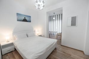 Postel nebo postele na pokoji v ubytování 1 Mai