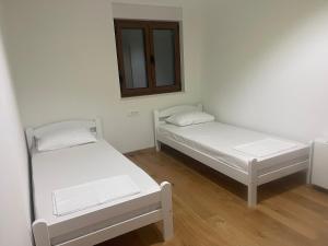 Postel nebo postele na pokoji v ubytování Apartman Ž