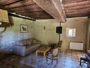 Χώρος καθιστικού στο Logement au clos des Fuselières.