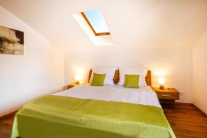 Postel nebo postele na pokoji v ubytování Ferienwohnung Am Moosbach