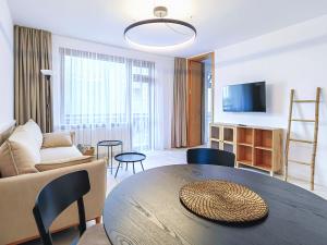 TV a/nebo společenská místnost v ubytování Guest House 7