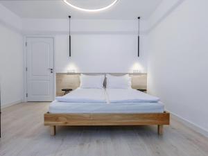 Postel nebo postele na pokoji v ubytování Guest House 7