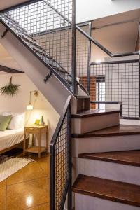 Postel nebo postele na pokoji v ubytování Deluxe 3BR Loft Walkable to Everything Downtown