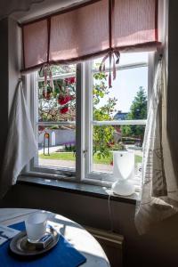 Ruang duduk di Litet gathus mitt i Ystad