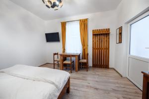 Postel nebo postele na pokoji v ubytování 1 Mai