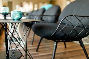 Posezení v ubytování Motel One München-Garching