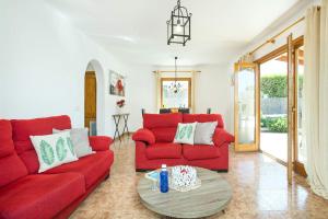 A seating area at Villa Maria Celia by Villa Plus