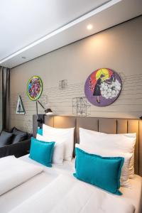 Posteľ alebo postele v izbe v ubytovaní Motel One Wien Westbahnhof