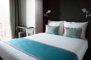 Postel nebo postele na pokoji v ubytování Motel One London-Tower Hill
