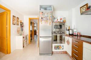 Η κουζίνα ή μικρή κουζίνα στο La casa de Marilo +24 φωτογραφίες