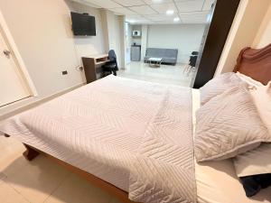 Voodi või voodid majutusasutuse Hostal Posada Del Sol toas