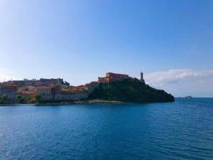 an island in the middle of the water at Via della Campana 17 in Portoferraio +18 photos