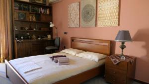 מיטה או מיטות בחדר ב-Ioanna's Elegant Residence, Agia Paraskevi