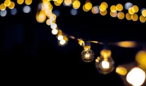 a string of lights with blurry lights in the background at Sunset Ridge 2King Beds Lake Hot Tub Pool in Canyon Lake