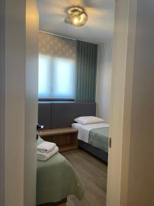 Postel nebo postele na pokoji v ubytování Kavala Luxury House