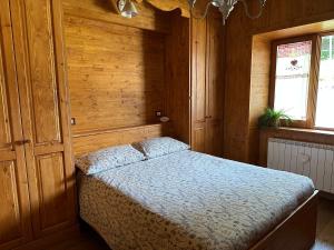 Postel nebo postele na pokoji v ubytování Luxury Suite Terminillo