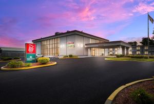 a rendering of the front of a hotel at HomeTowne Studios by Red Roof Painted Post in Painted Post