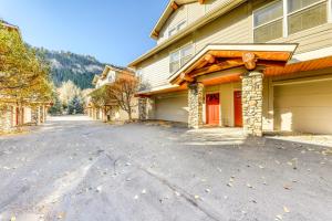 a house with a driveway in front of it at Sun Bird Getaway at River Run in Ketchum