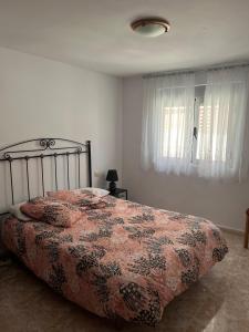 Postel nebo postele na pokoji v ubytování Las Canchillas