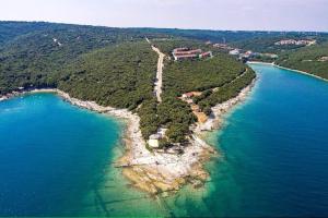 an aerial view of an island in the water at Apartment Vacation Rental Near Pula in Loborika