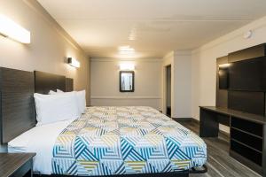 Llit o llits en una habitació de Motel 6-Baytown, TX - Garth Rd