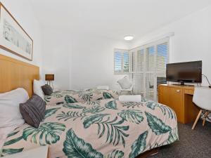 Postel nebo postele na pokoji v ubytování RESORT ON THE BEACH 2214/2215 + 14 fotografií