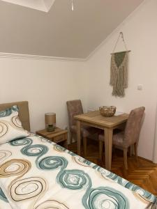 Postel nebo postele na pokoji v ubytování Guest Radic Apartment 2