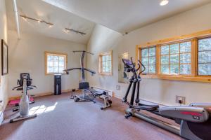 a gym with two treadmills and two exercise bikes at #202 Grand Lodge South in Government Camp