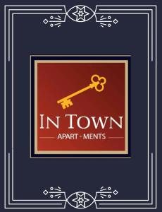 una imagen de un cartel en la ciudad con una llave dorada en InTown Apart Santa Cruz en Santa Cruz