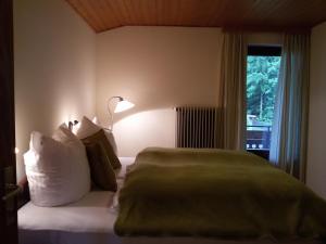 Posteľ alebo postele v izbe v ubytovaní Haus Mansaura