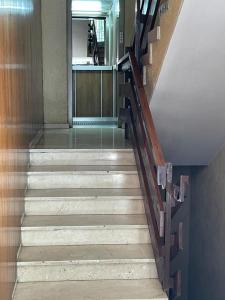 a stairway in a building with a stair case at VISTAS A SANTO DOMINGO in León