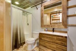 a bathroom with a toilet and a shower at Golden Meadow Getaway Waterfront Retreat with Deck in Golden Meadow +21 photos