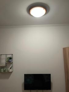 TV a/nebo společenská místnost v ubytování Guest Radic Room Soba + 5 fotografií