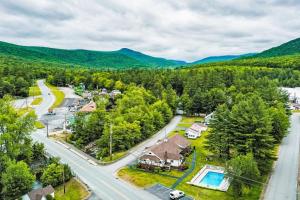 an aerial view of a house and a road with a pool at Riverbank Connecting Rooms 3 & 5 in Lincoln