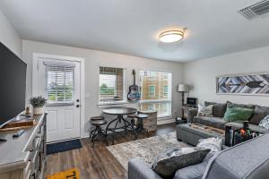 a living room with a couch and a table at 1062 Riverfront in Nashville