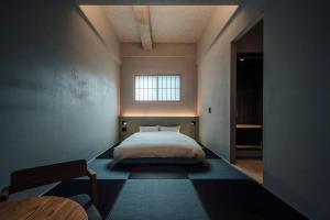 Kama o mga kama sa kuwarto sa 無垢　入船の宿