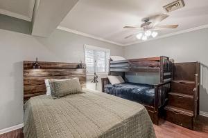 a bedroom with a bed and a ceiling fan at Smoky Mountain Estate in Sevierville