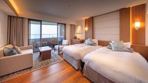 Postel nebo postele na pokoji v ubytování Izu Hotel Resort & Spa + 83 fotografií