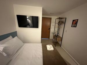 Letto o letti in una camera di Audaar Tech Suítes - Aeroporto de Congonhas