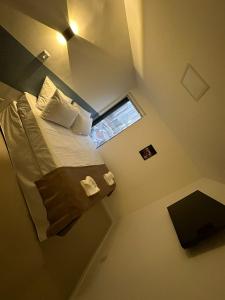 Letto o letti in una camera di Audaar Tech Suítes - Aeroporto de Congonhas