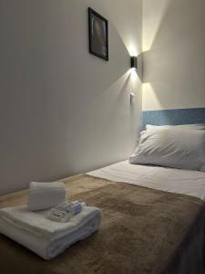 Letto o letti in una camera di Audaar Tech Suítes - Aeroporto de Congonhas