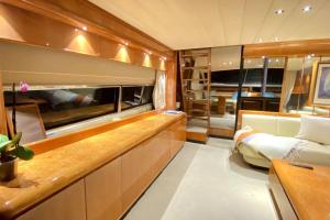 a master bedroom of a yacht with a bed and a desk at Sleep Under the Stars. in Villeneuve-Loubet