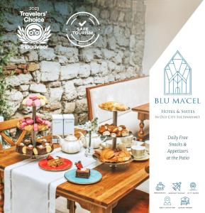 a table with a buffet of food on it at Blu Macel Hotel & Suites -Old City Sultanahmet in Istanbul