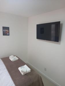 Letto o letti in una camera di Audaar Tech Suítes - Aeroporto de Congonhas